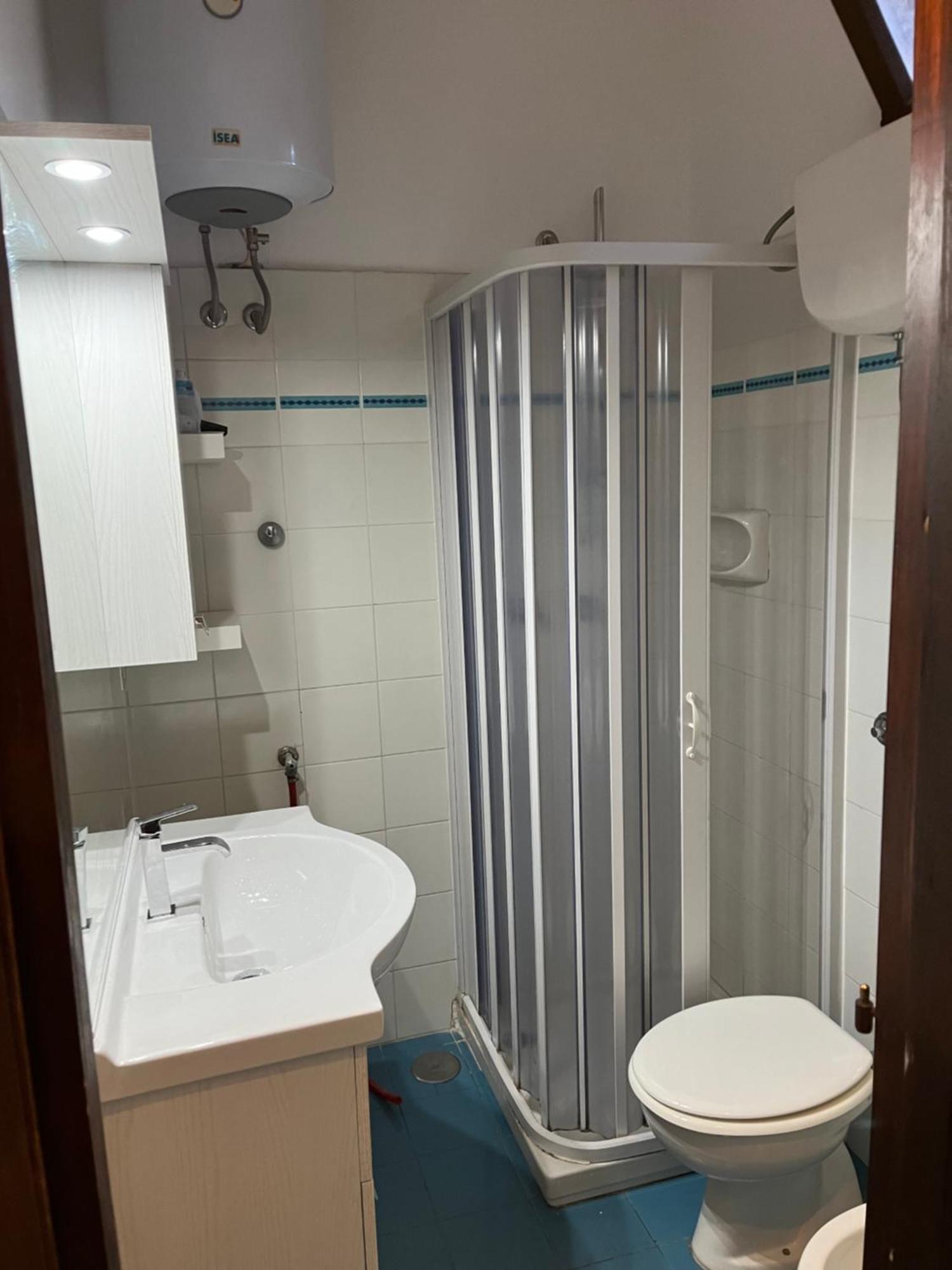 Bilocali Residenza Mediterranea Cannigione Bagian luar foto