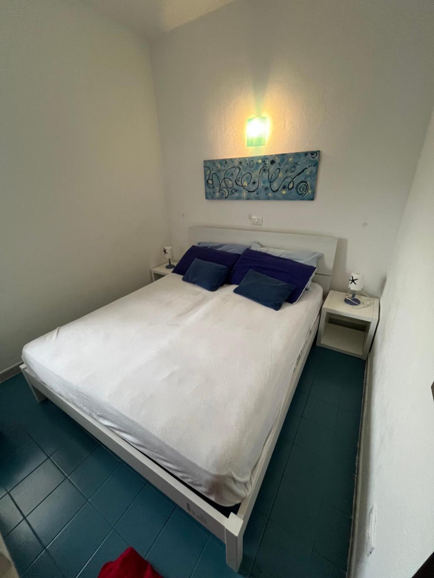 Bilocali Residenza Mediterranea Cannigione Bagian luar foto